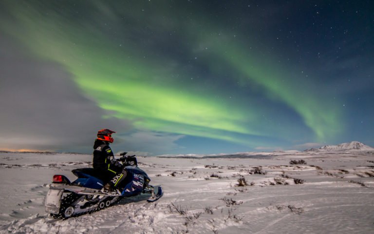 Northern light snowmobile tour